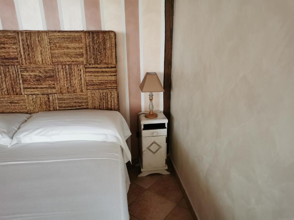 Posteľ alebo postele v izbe v ubytovaní B&B oasi di mamma clara