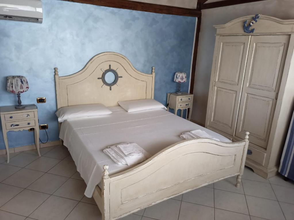 Posteľ alebo postele v izbe v ubytovaní B&B oasi di mamma clara