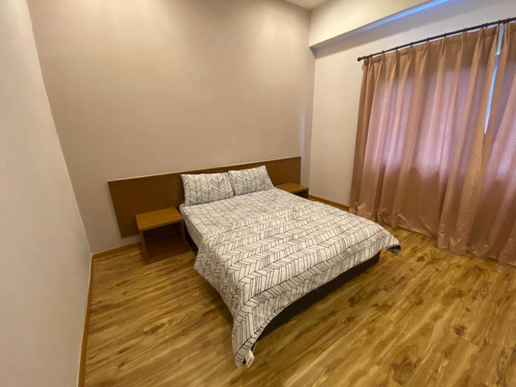 Postel nebo postele na pokoji v ubytování Hills Aranda Nova Hotel