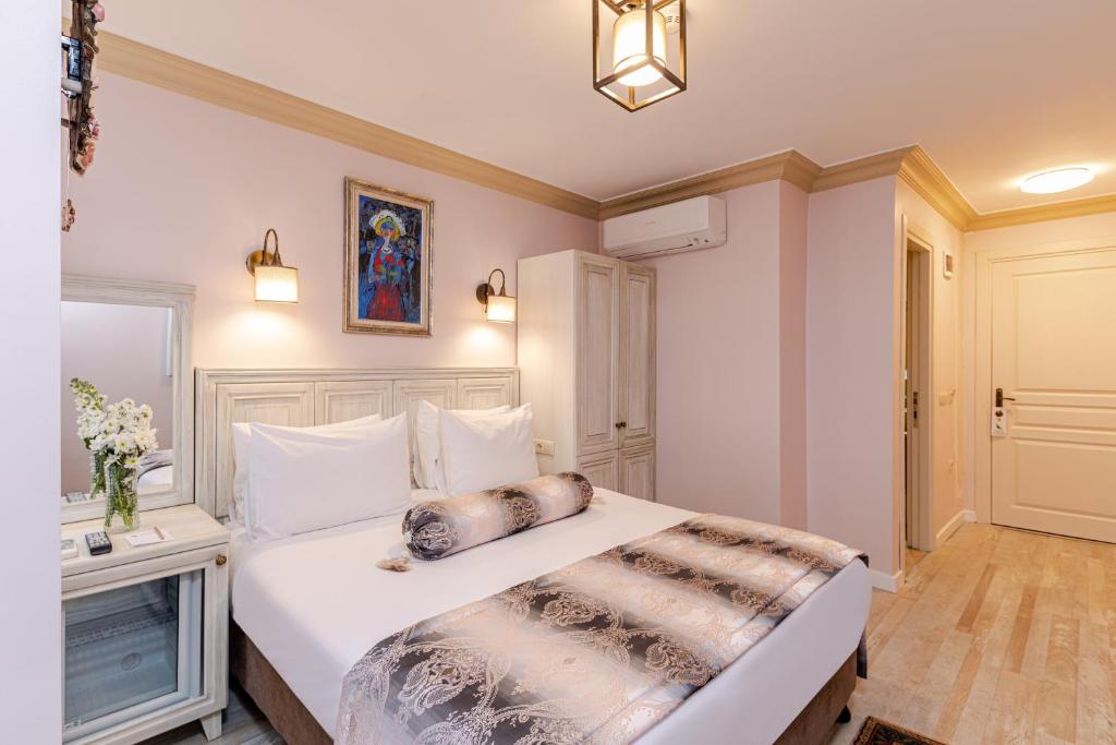 Postel nebo postele na pokoji v ubytování Agora Guesthouse