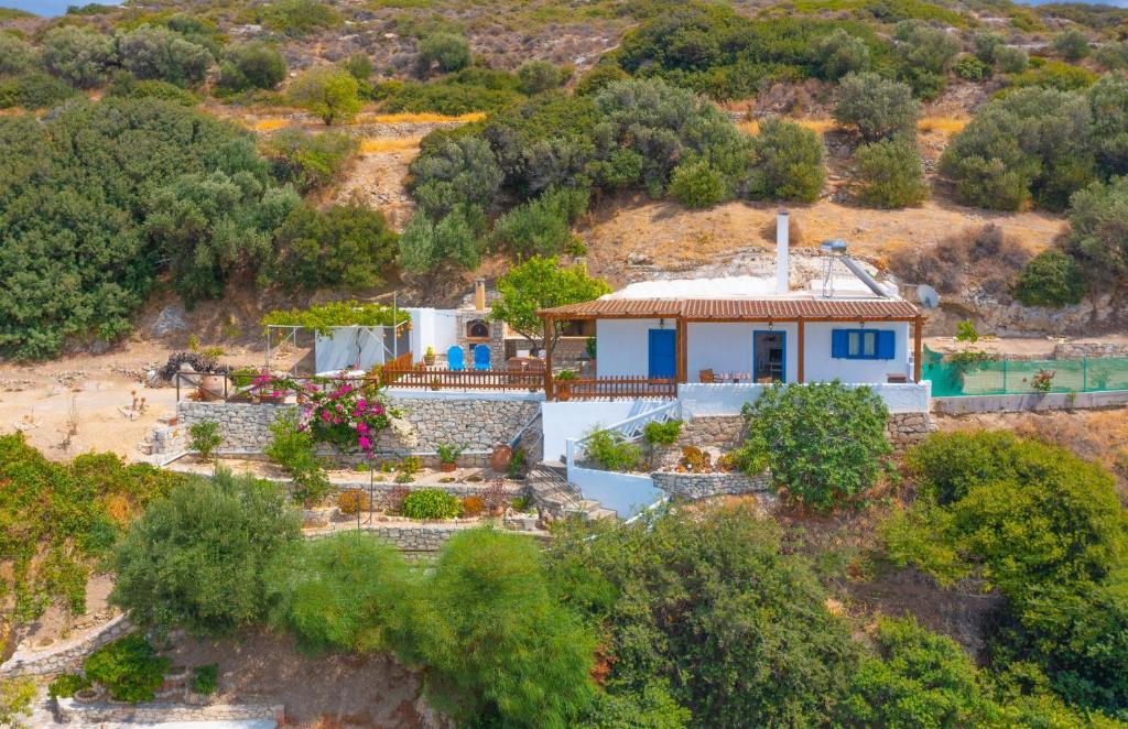 an aerial view of a house on a hill at The Rock & The Lemon Tree in Sitia