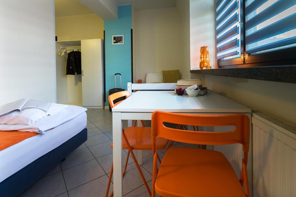 Hello Hostel & Apartmentsにあるベッド
