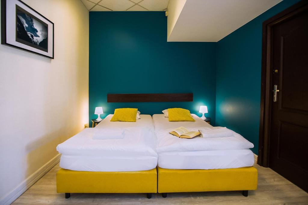 Hello Hostel & Apartmentsにあるベッド