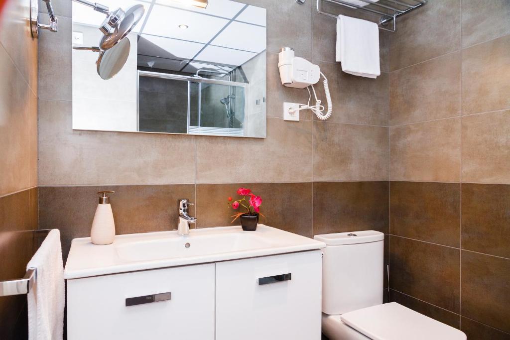 Kúpeľňa v ubytovaní Feelathome Plaza Apartments