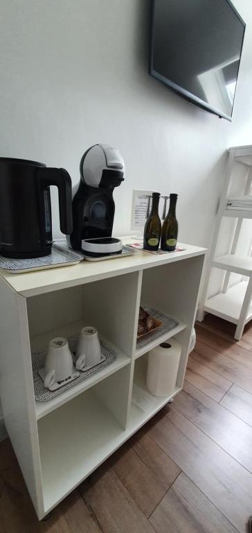 TV a/nebo společenská místnost v ubytování Pasta Factory Guest Rooms