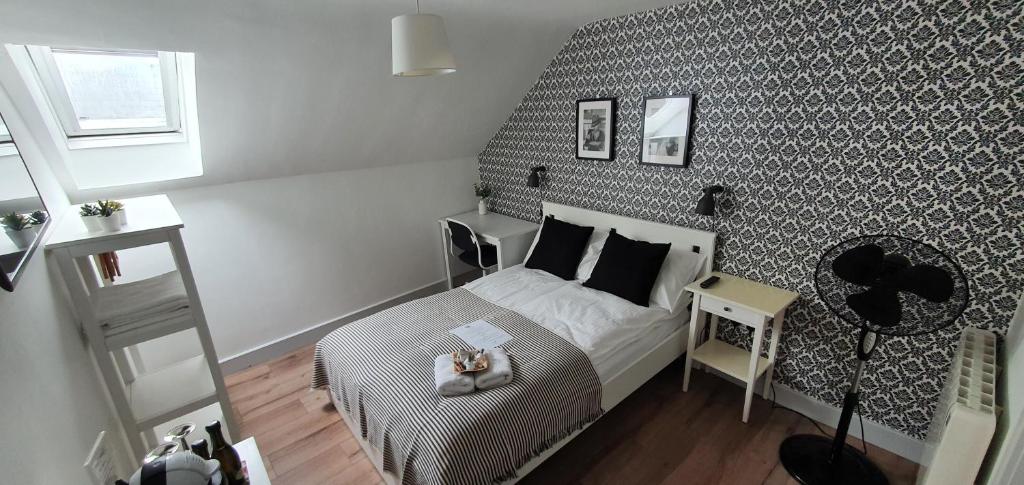 Postel nebo postele na pokoji v ubytování Pasta Factory Guest Rooms
