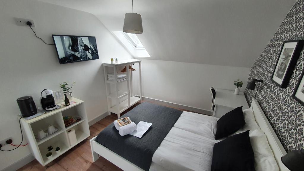 TV a/nebo společenská místnost v ubytování Pasta Factory Guest Rooms