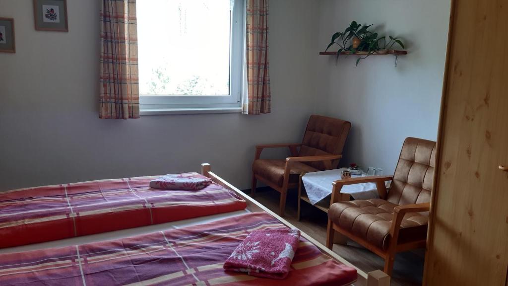Postel nebo postele na pokoji v ubytování Pension Kristýna
