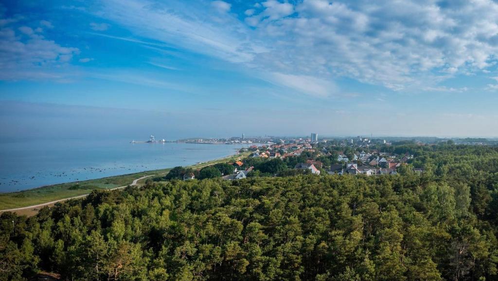 an aerial view of a town on a hill next to the water at Villa Lindell in Höganäs