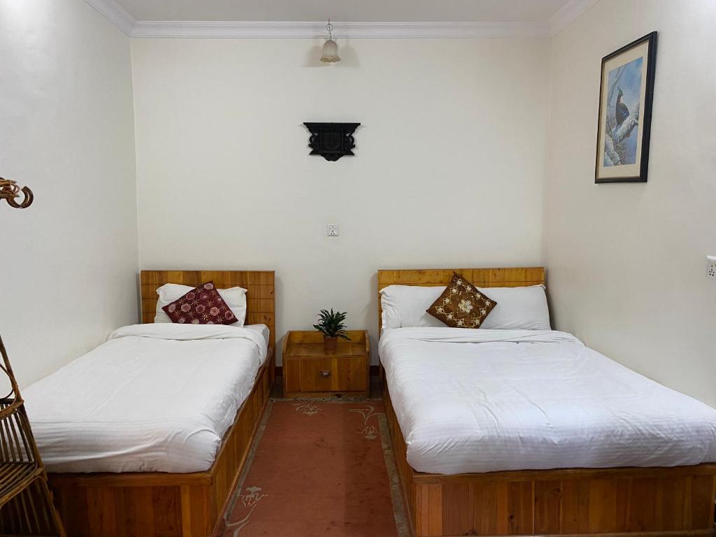 Voodi või voodid majutusasutuse Birds Nest Hostel toas