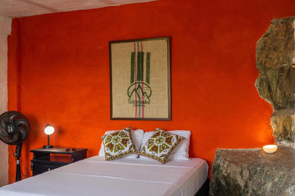 Ένα ή περισσότερα κρεβάτια σε δωμάτιο στο Casa Blanca - Taganga