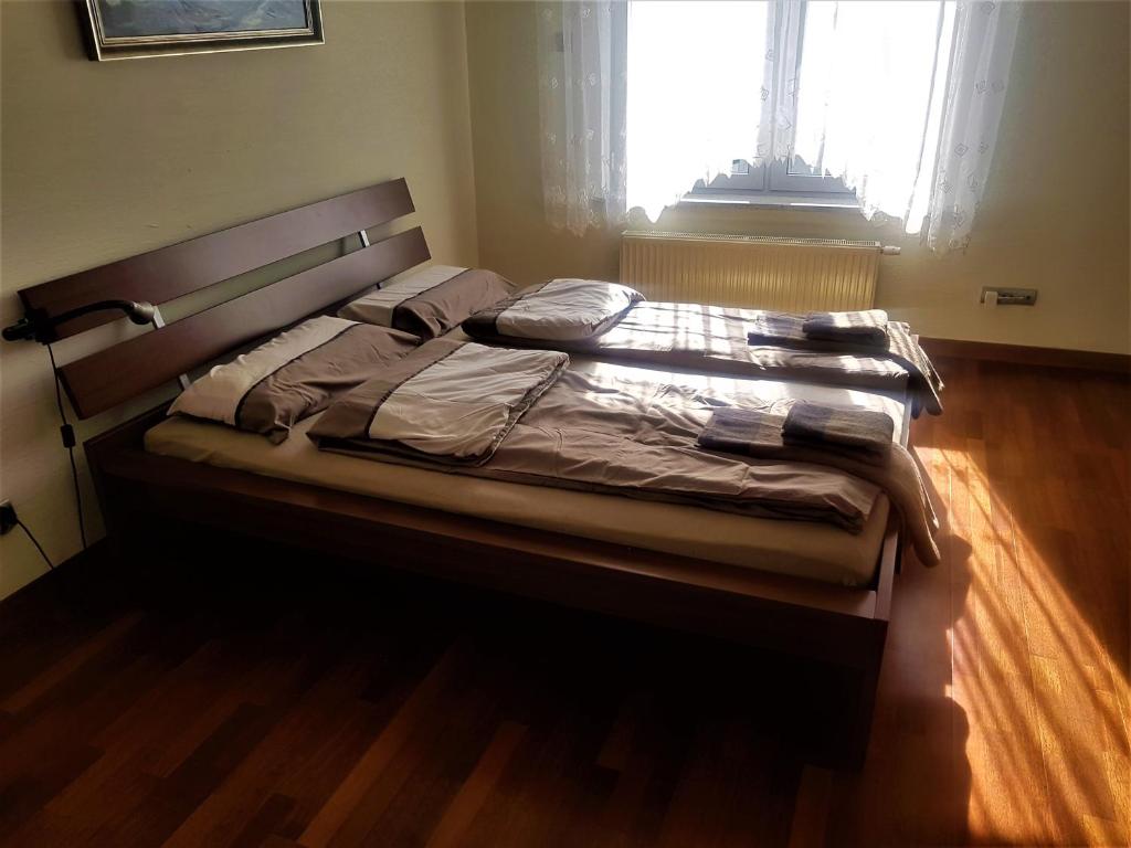 Posteľ alebo postele v izbe v ubytovaní Apartament przy plazy