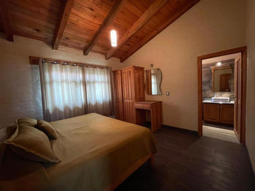Postel nebo postele na pokoji v ubytování Cabañas Mazzatl 6 pax