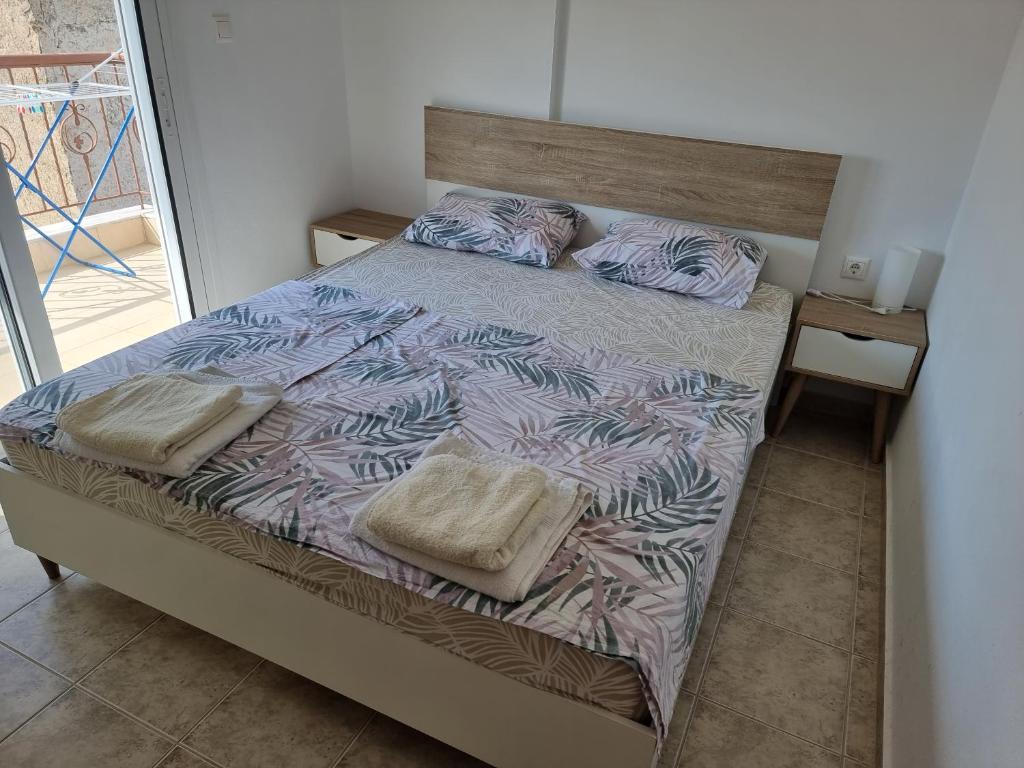 Postel nebo postele na pokoji v ubytování Lucas2 Lux Flogita apartment