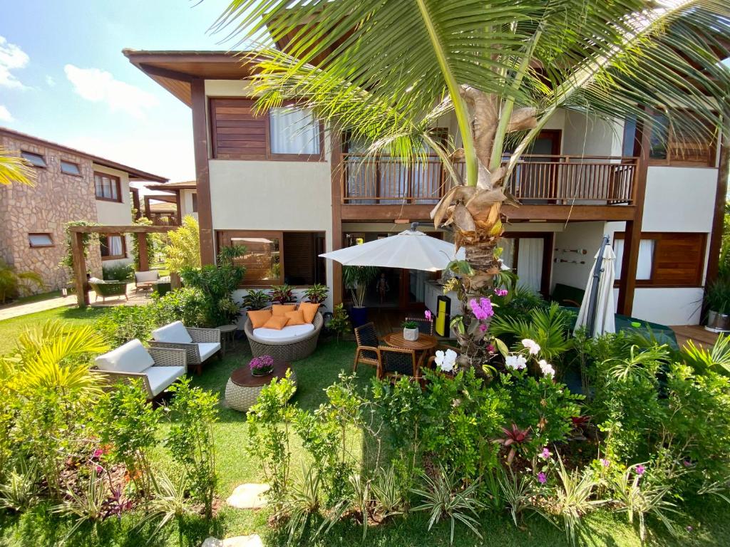 an aerial view of the garden of a villa at Apartamento em barra grande - Villaggio di Mare - apto 02 bl 04 - Garden in Barra Grande
