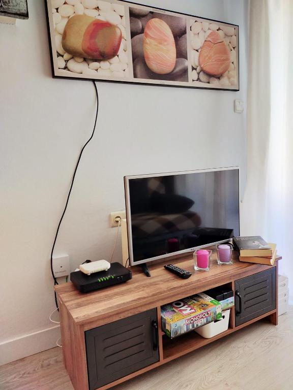 TV a/nebo společenská místnost v ubytování ABAT OLIBA
