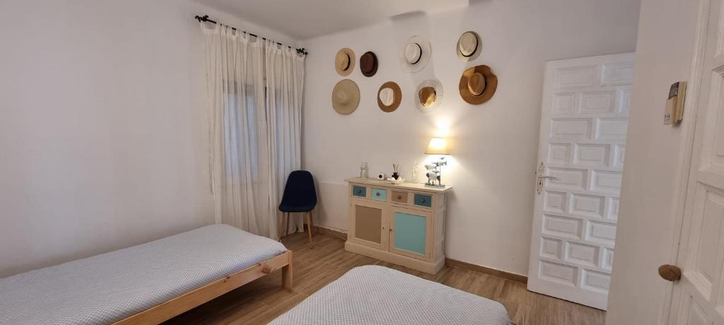 A bed or beds in a room at Casa 24