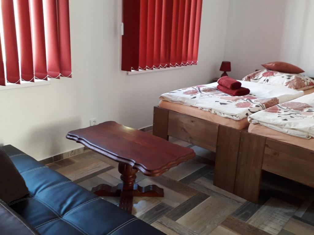 Postel nebo postele na pokoji v ubytování Šenk U Kovárny