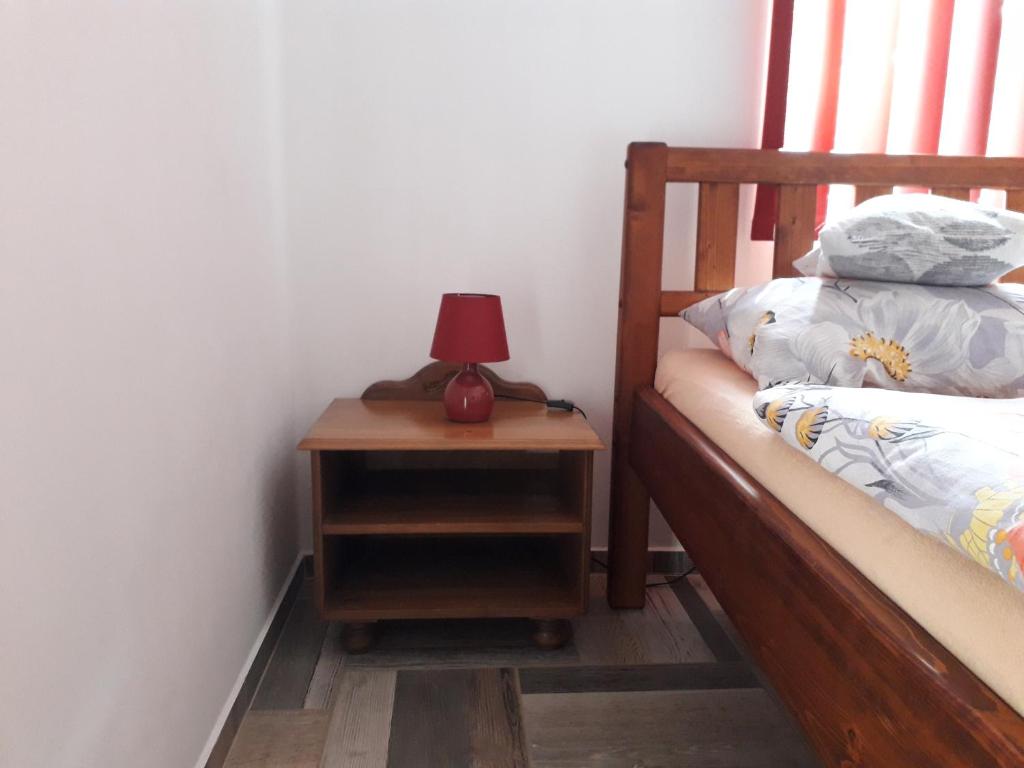 Postel nebo postele na pokoji v ubytování Šenk U Kovárny