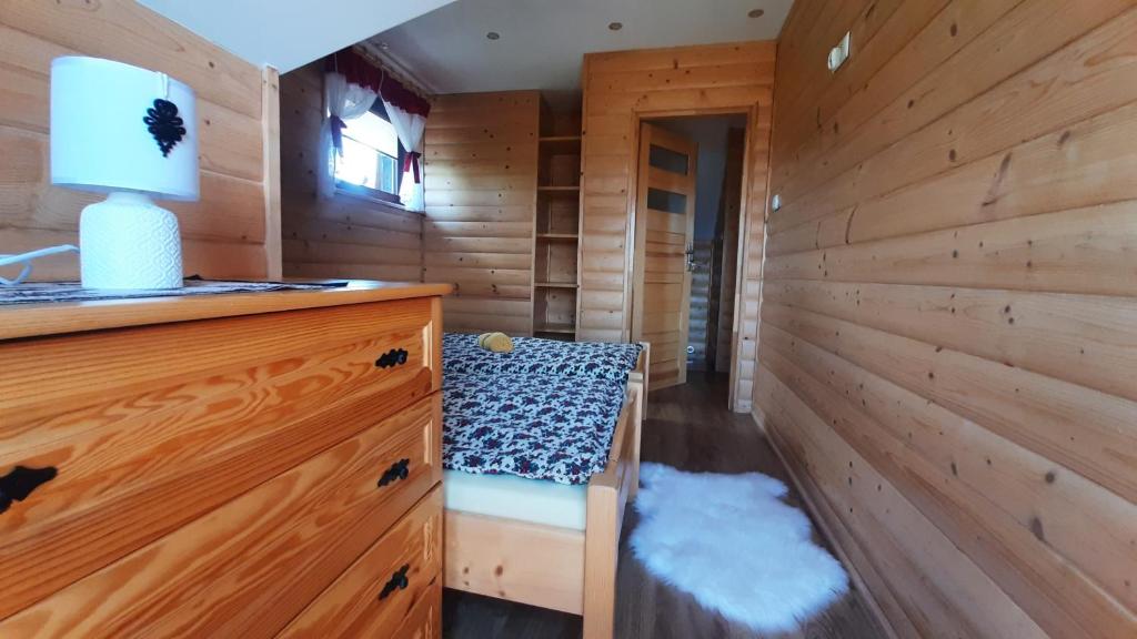 Televízia a/alebo spoločenská miestnosť v ubytovaní Podhalańskie Domki u Magdusi i Marcina z Jacuzzi