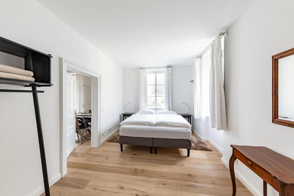 A bed or beds in a room at Villa Bertholini