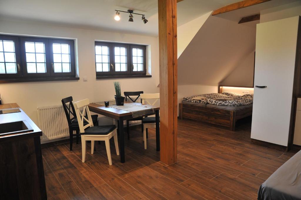 Postel nebo postele na pokoji v ubytování Apartmány U Fibichů