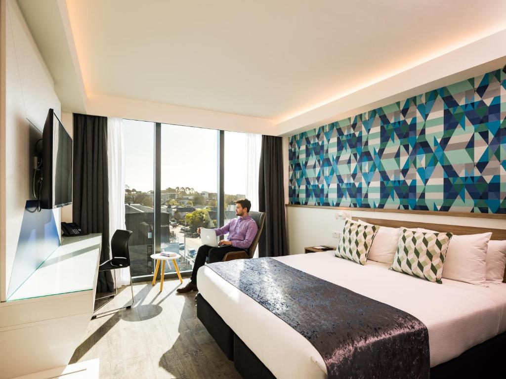 TV a/nebo společenská místnost v ubytování Carnmore Hotel Christchurch