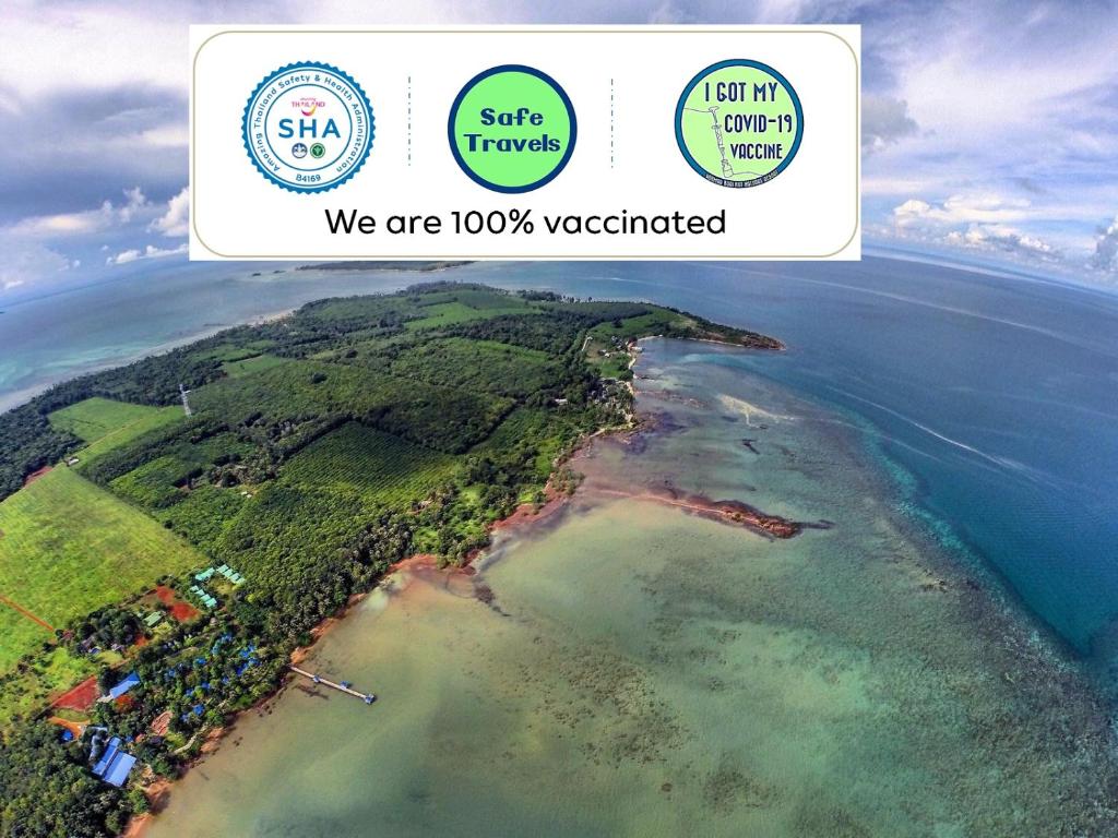 an island in the ocean with the words we are vaccinated at Koh Mak Buri Hut Natural Resort in Ko Mak