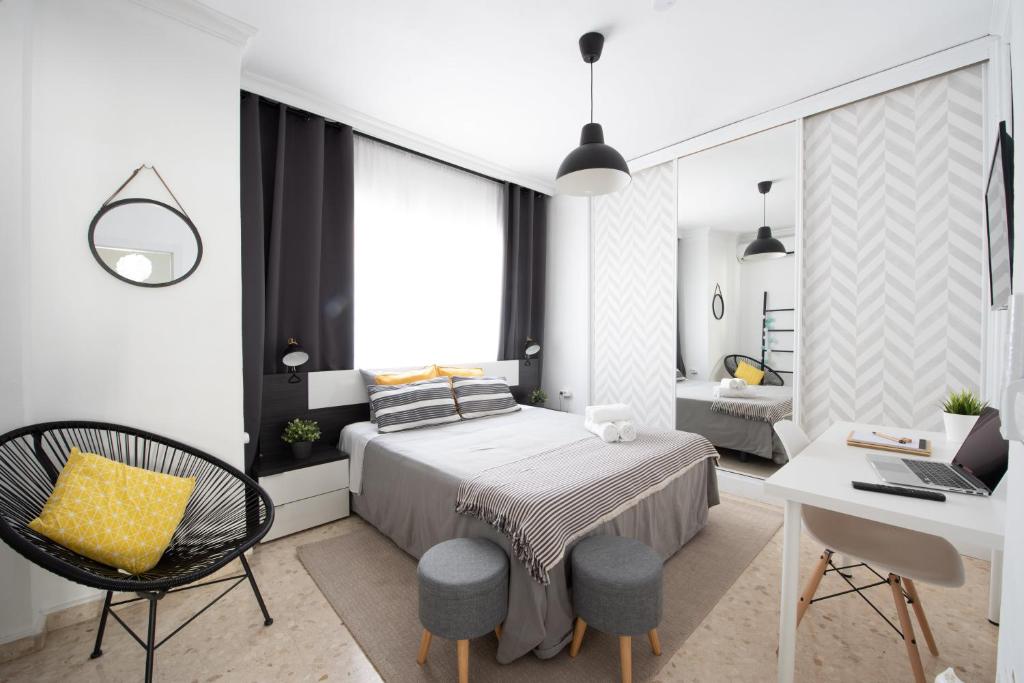 Postel nebo postele na pokoji v ubytování Nordik Rooms Urban - Trinidad "Copenhague"