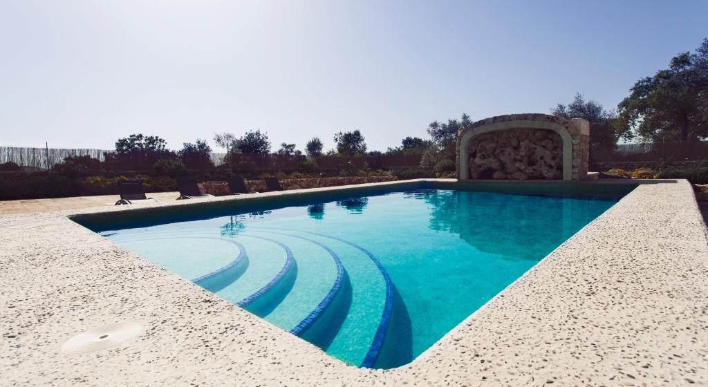 The swimming pool at or close to S'Hort Can Capità