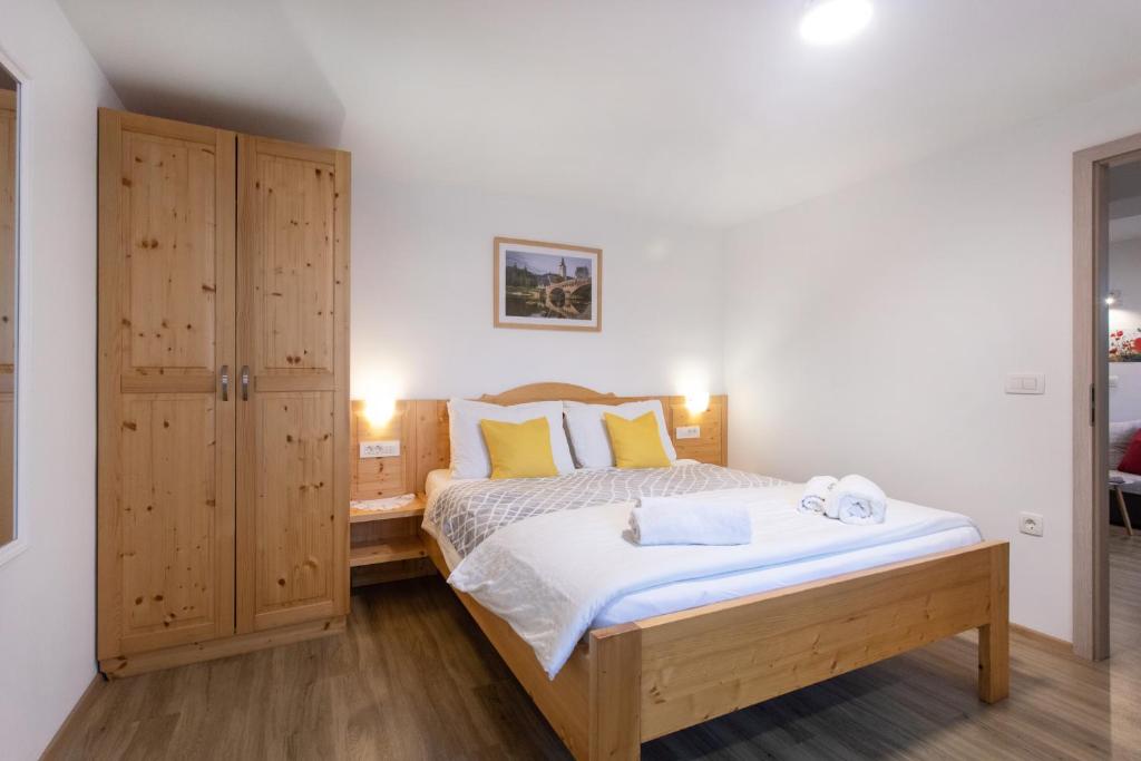 Postel nebo postele na pokoji v ubytování Apartments Repinc