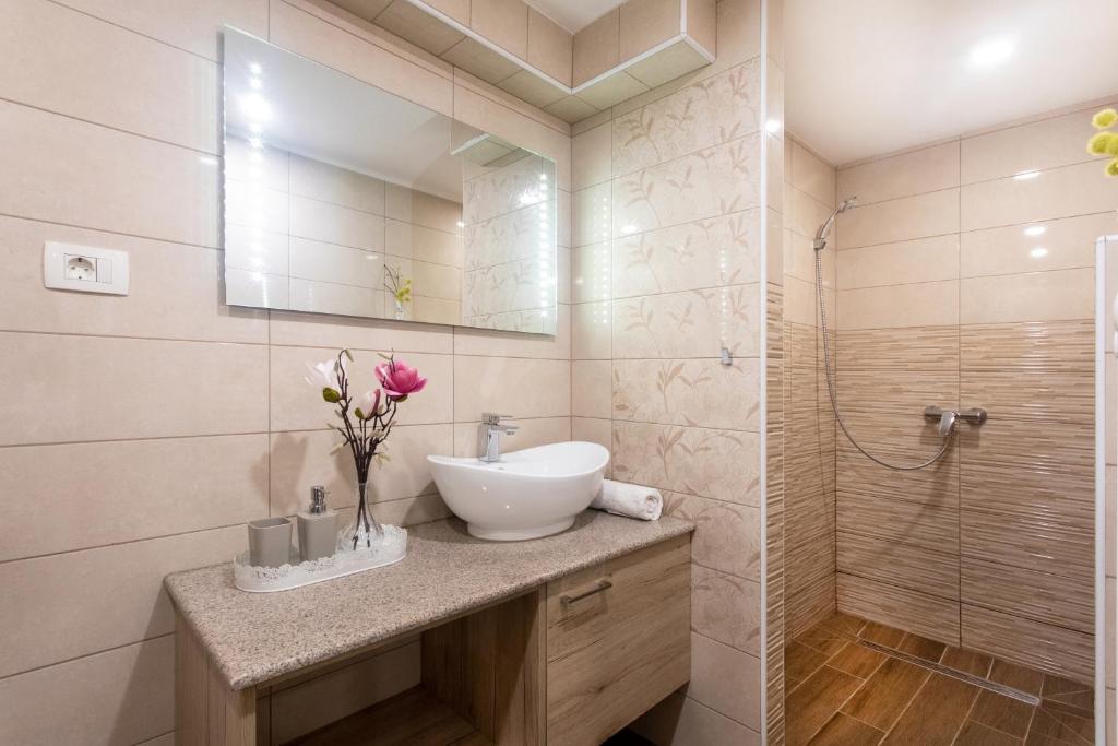 Koupelna v ubytování Apartments Repinc