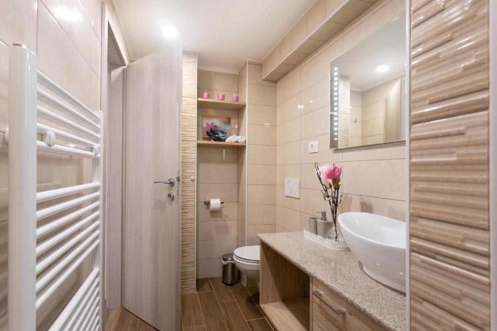 Koupelna v ubytování Apartments Repinc