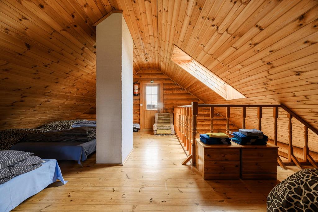 Postel nebo postele na pokoji v ubytování Nuustaku Guesthouse