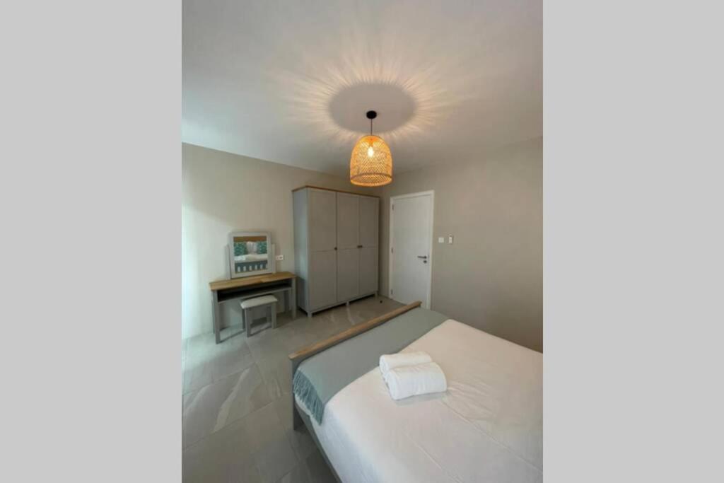 Postel nebo postele na pokoji v ubytování Bois Mapou Self Catering Apartments Unit 103