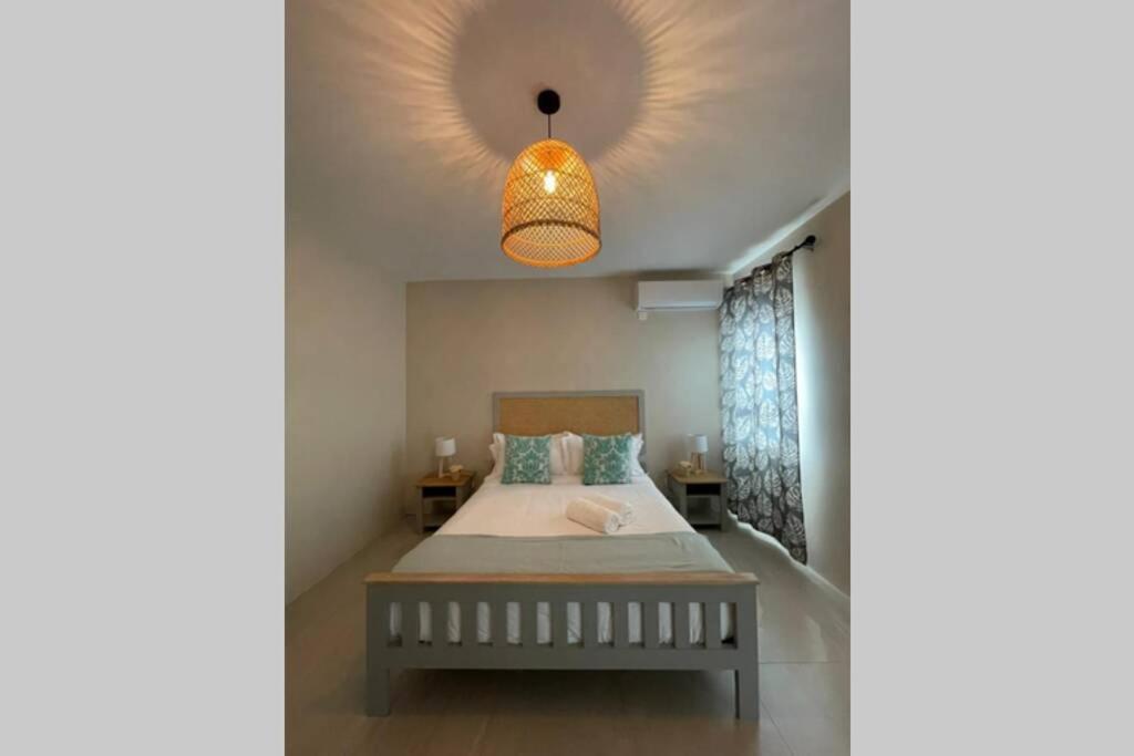 Postel nebo postele na pokoji v ubytování Bois Mapou Self Catering Apartments Unit 101