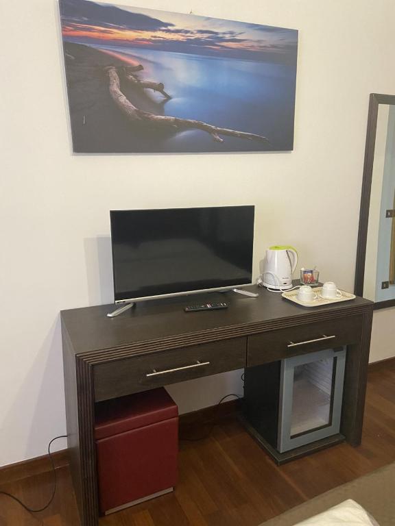 Telewizja i/lub zestaw kina domowego w obiekcie Bed and Breakfast Impruneta28