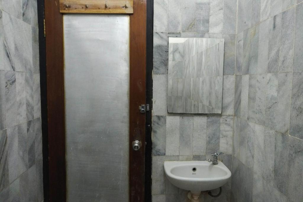Koupelna v ubytování Hotel Syariah Cordova