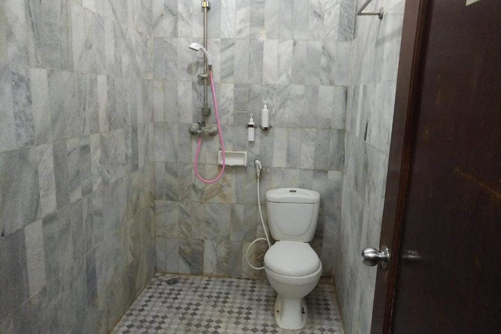 Koupelna v ubytování Hotel Syariah Cordova