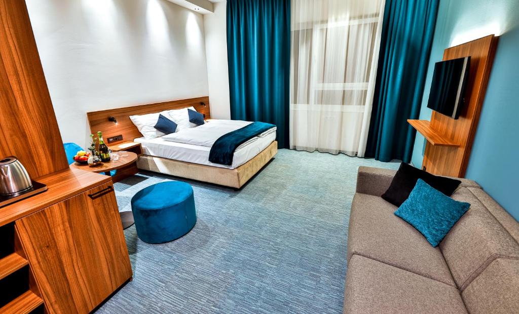 Voodi või voodid majutusasutuse Hotel Das Zeit toas