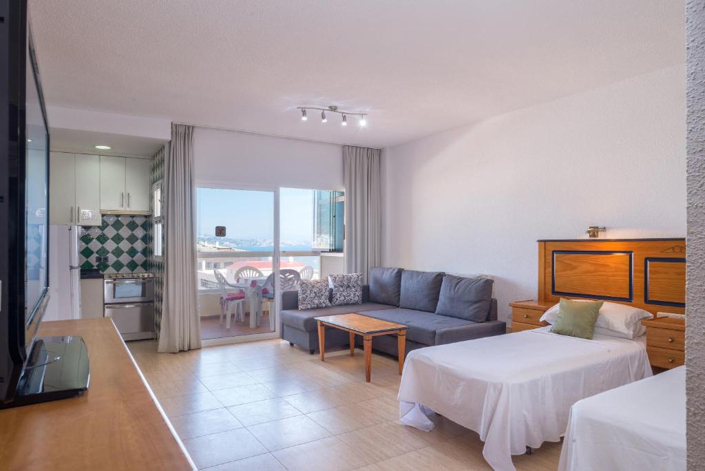 Postel nebo postele na pokoji v ubytování Pyr Aparthotel studio