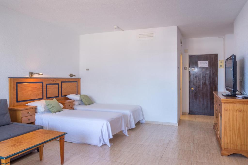 TV a/nebo společenská místnost v ubytování Pyr Aparthotel studio