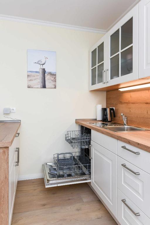 Kuchyň nebo kuchyňský kout v ubytování Haus Meerzeit