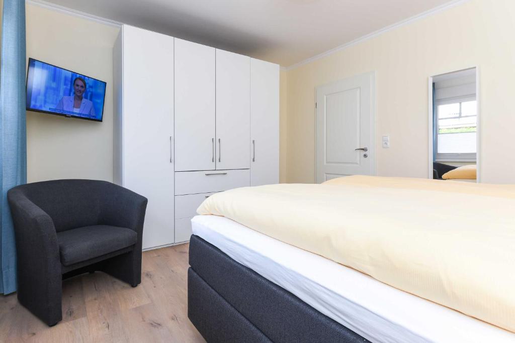 Postel nebo postele na pokoji v ubytování Haus Meerzeit
