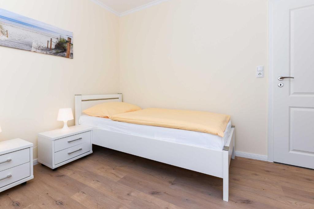 Postel nebo postele na pokoji v ubytování Haus Meerzeit