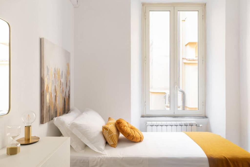 Posteľ alebo postele v izbe v ubytovaní iFlat Monti Elegant Apartment with Terrace