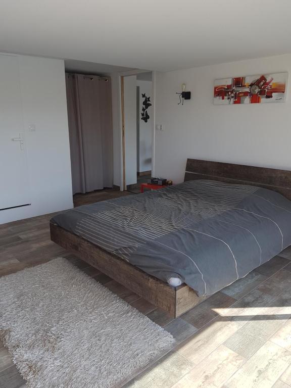 Postel nebo postele na pokoji v ubytování Suite cocooning - Route des Vins
