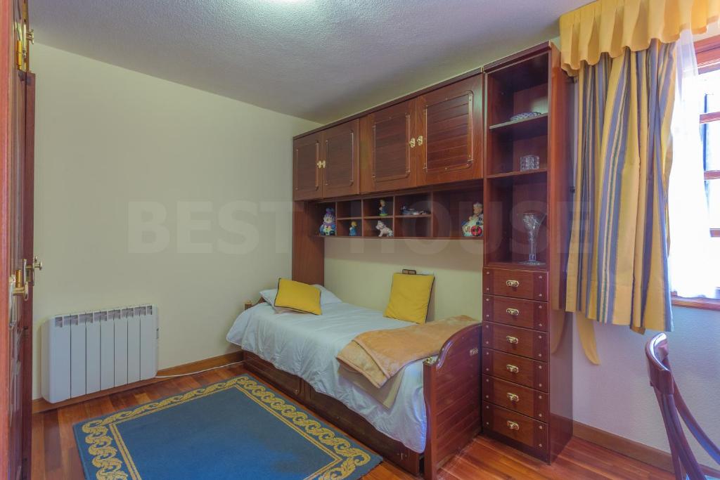 A bed or beds in a room at Fantastic Rural House with Pool and terrace
