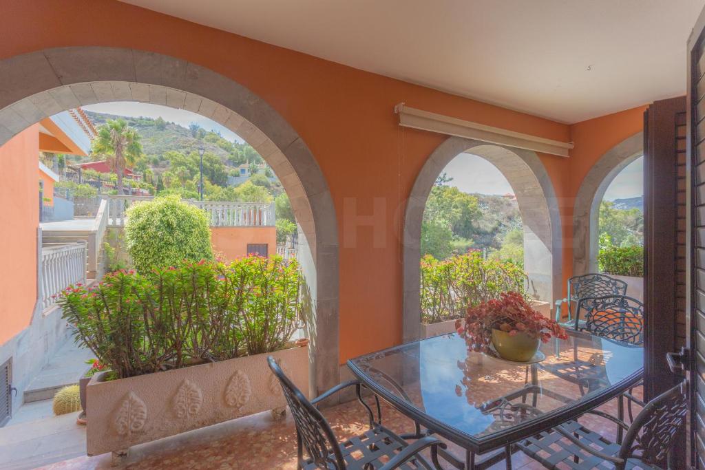 A balcony or terrace at Fantastic Rural House with Pool and terrace