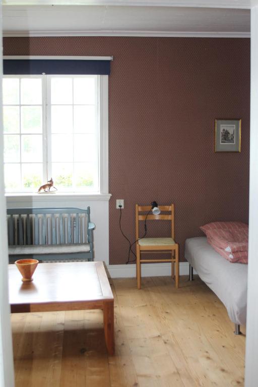 Postel nebo postele na pokoji v ubytování Yxkullsund Säteri B&B - Manor & Estate since 1662